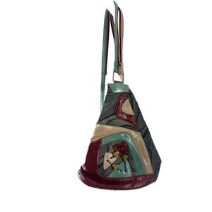 Cirque du Soleil Sling Backpack Patchwork Triangle Bag Red Teal Tan Faux Leather